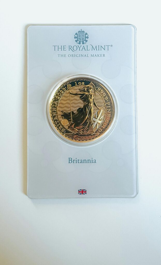 Luxurious gold Britannia coin encapsulated by The Royal Mint. A collector's treasure from the UK.